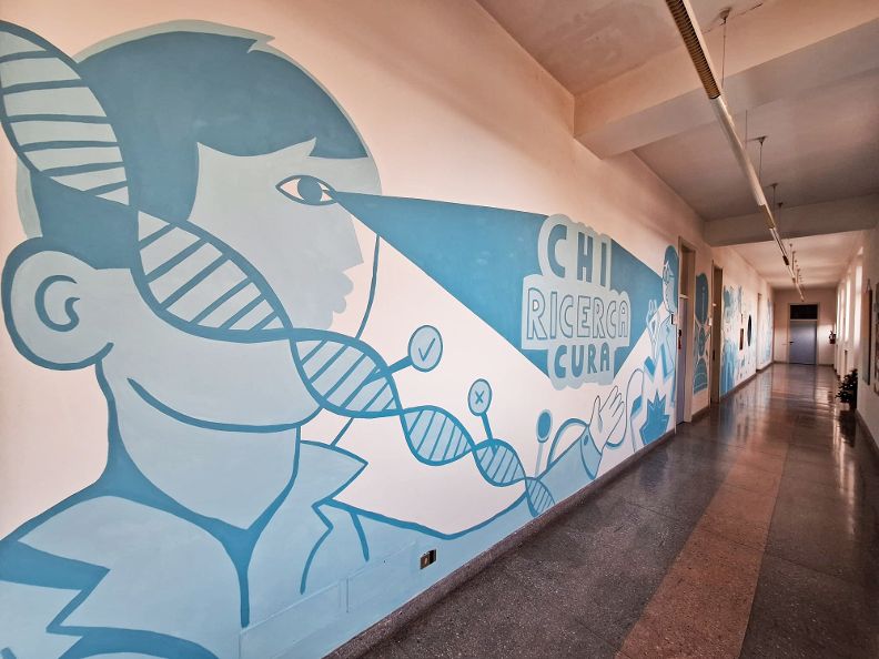 Inaugurati i murales della nuova sede DAIRI, eseguiti da Lele Gastini